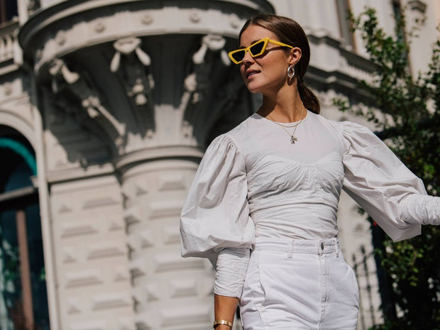 The puffed white shirt is back on trend this season.